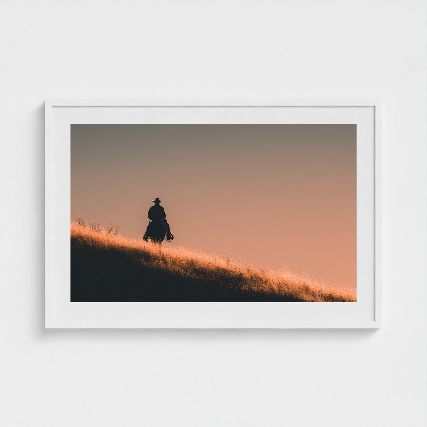 minimalist-cowboy-silhouette-at-sunrise-desert-h 36x24-white frame frame