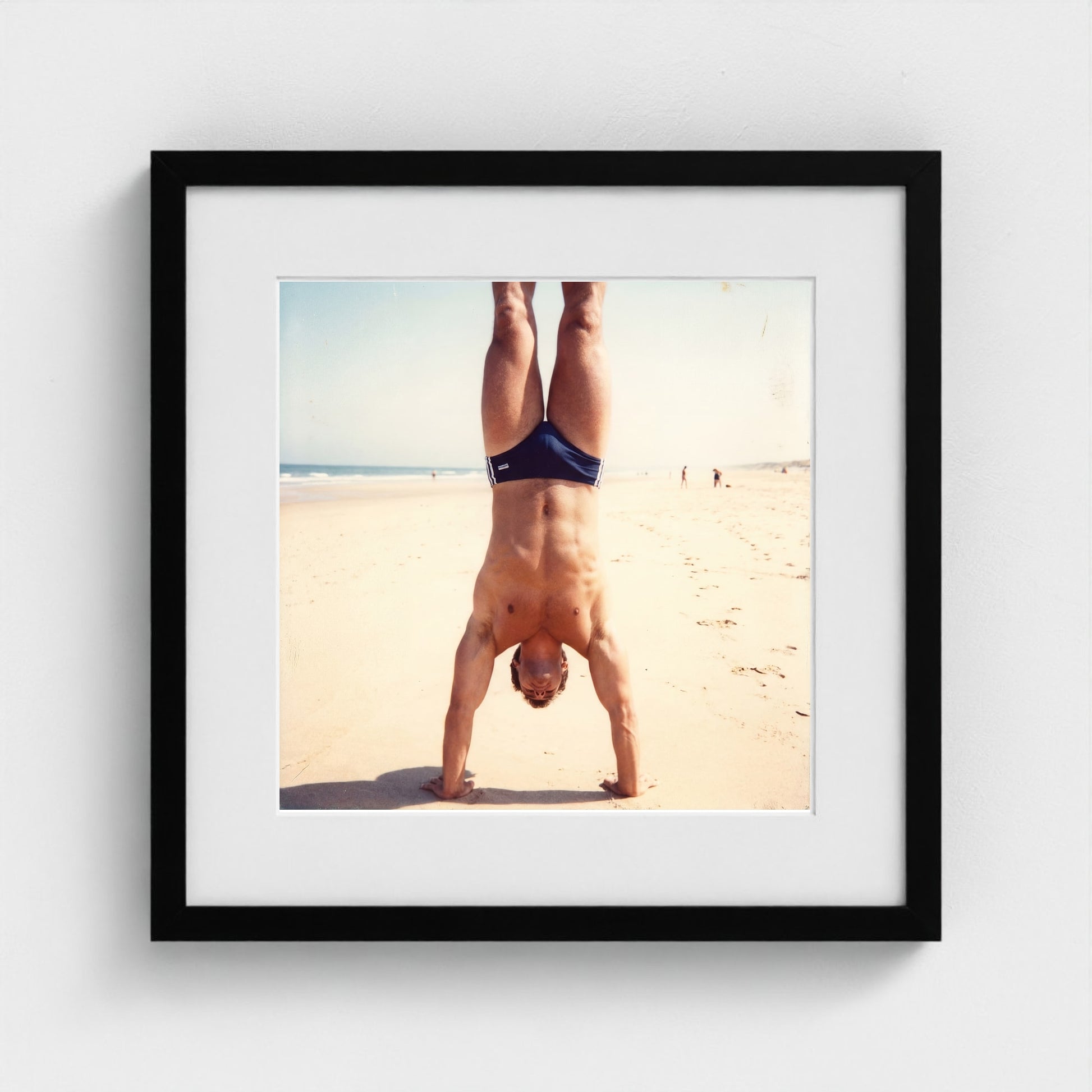 2026 03 12 17 48 00 Handstand Beach Muscular 16x16-black frame — Fire Island Modern