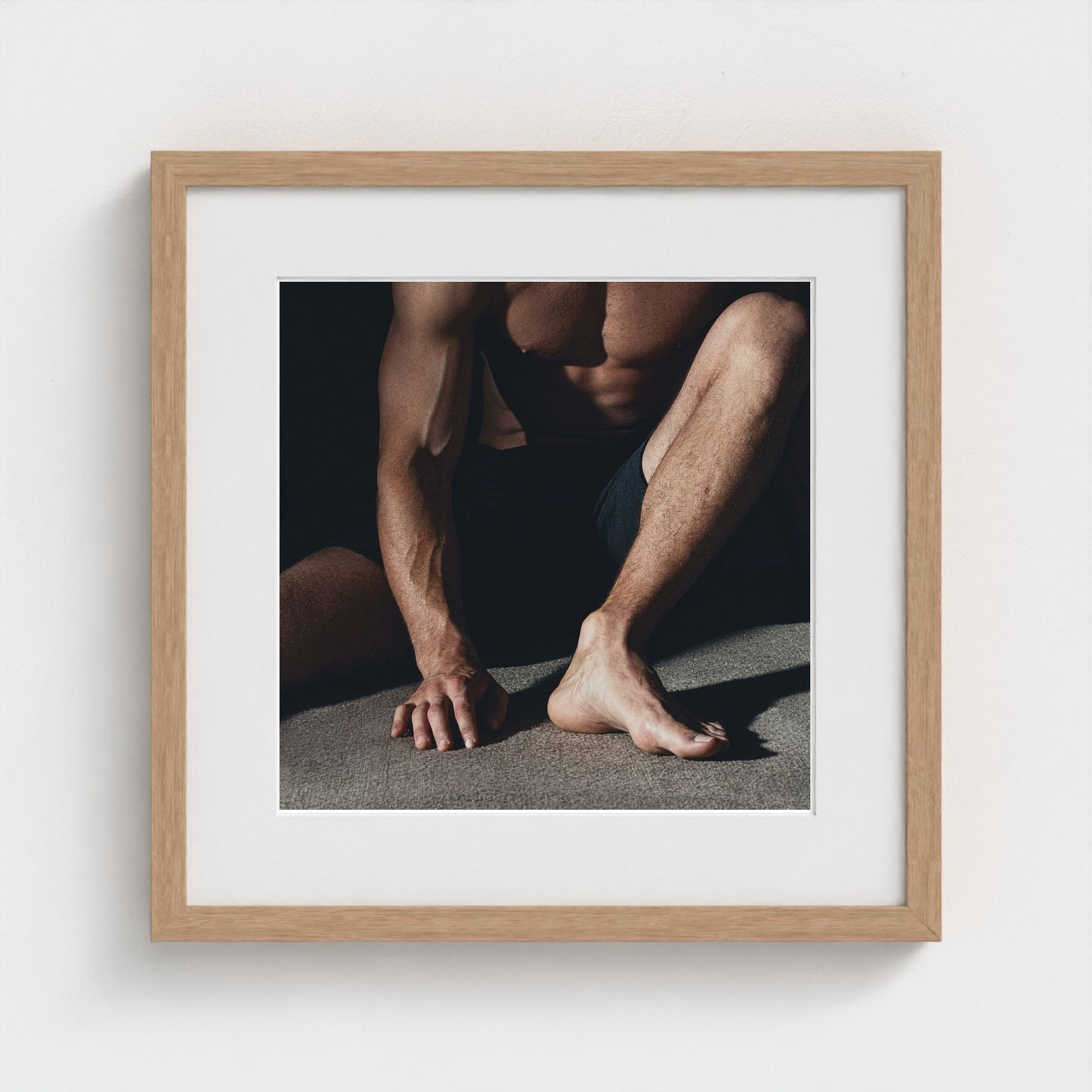 a-muscular-mans-foot-close-up-of-feet-and-ankles 16x16-natural frame frame