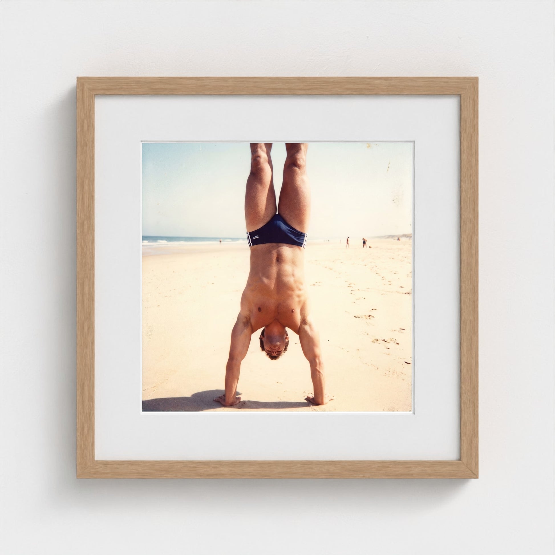 2026 03 12 17 48 00 Handstand Beach Muscular 16x16-natural frame — Fire Island Modern