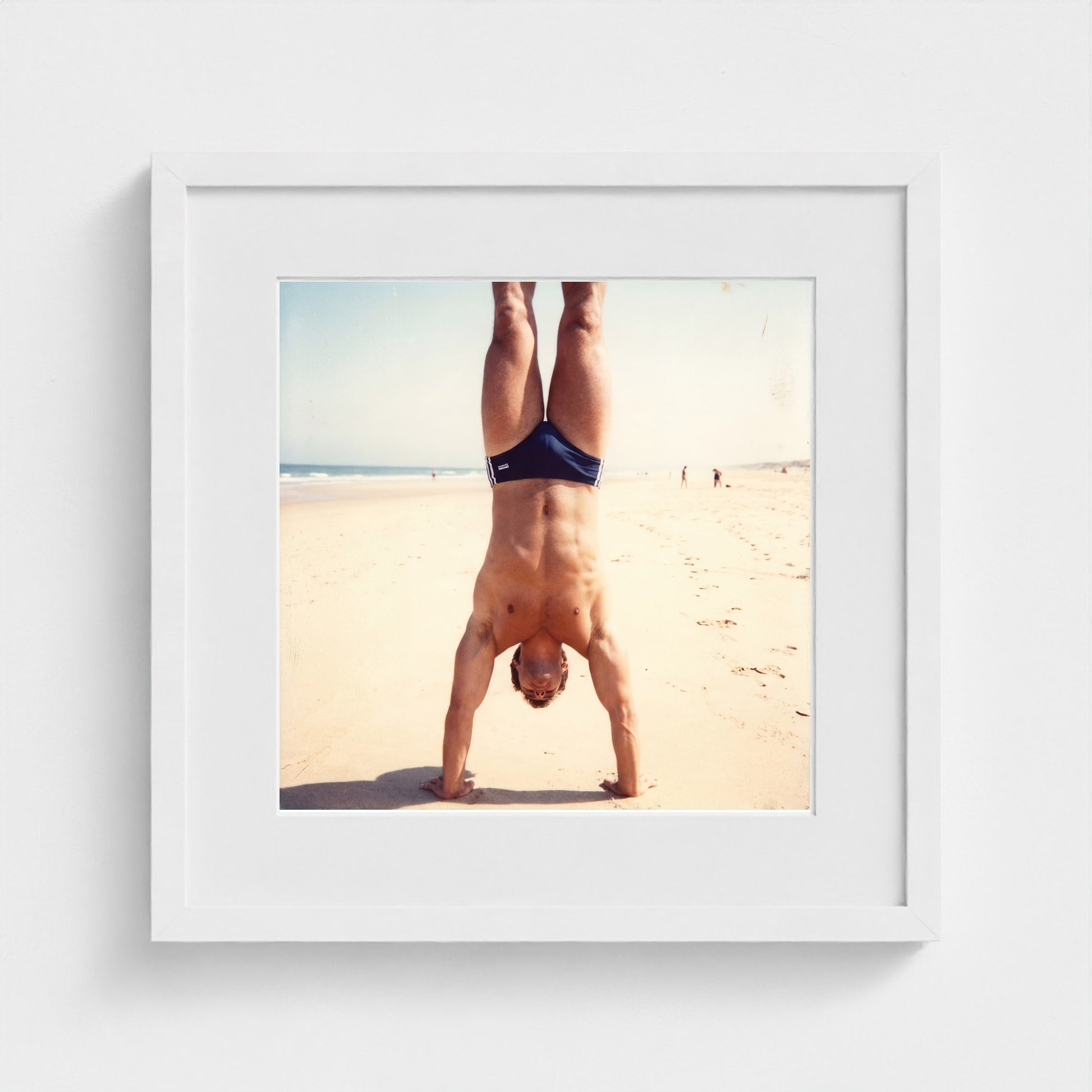 2026 03 12 17 48 00 Handstand Beach Muscular 16x16-white frame — Fire Island Modern