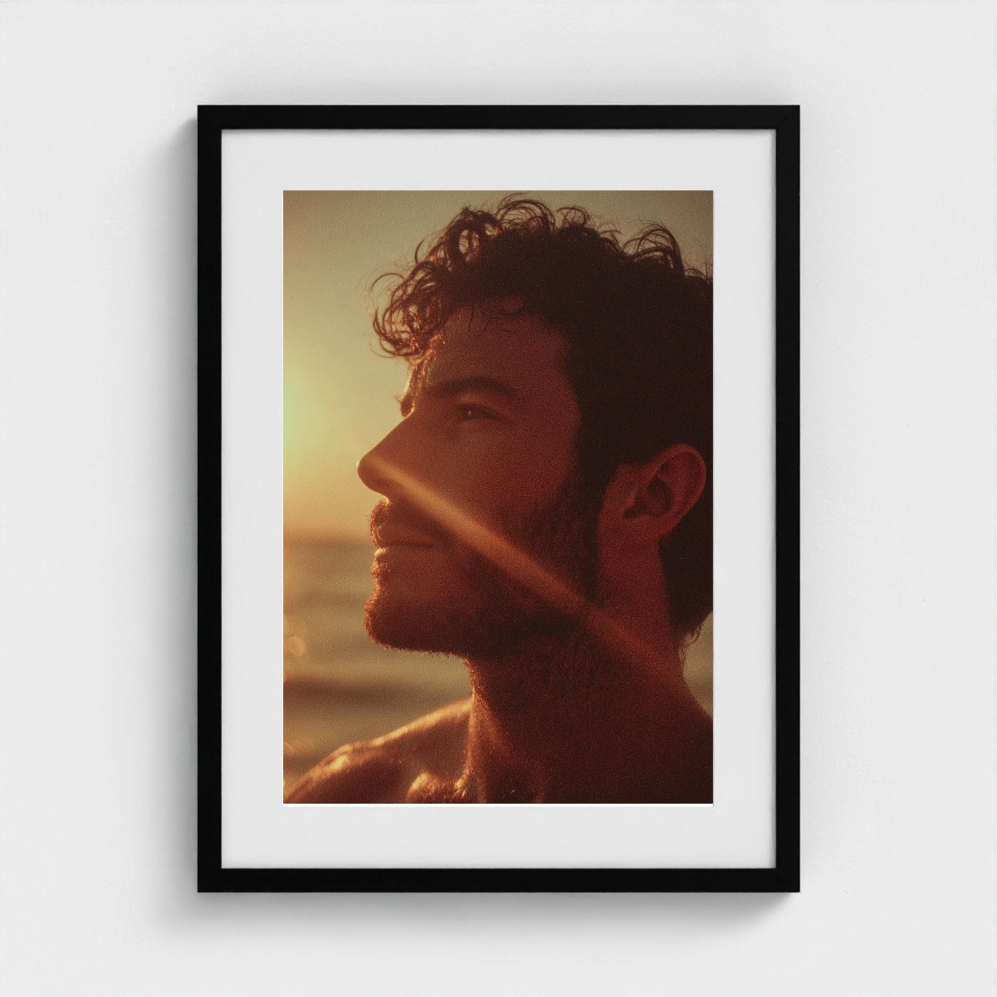 portrait-of-man-gazing-out-at-ocean-polaroid-sty 18x24-black frame frame