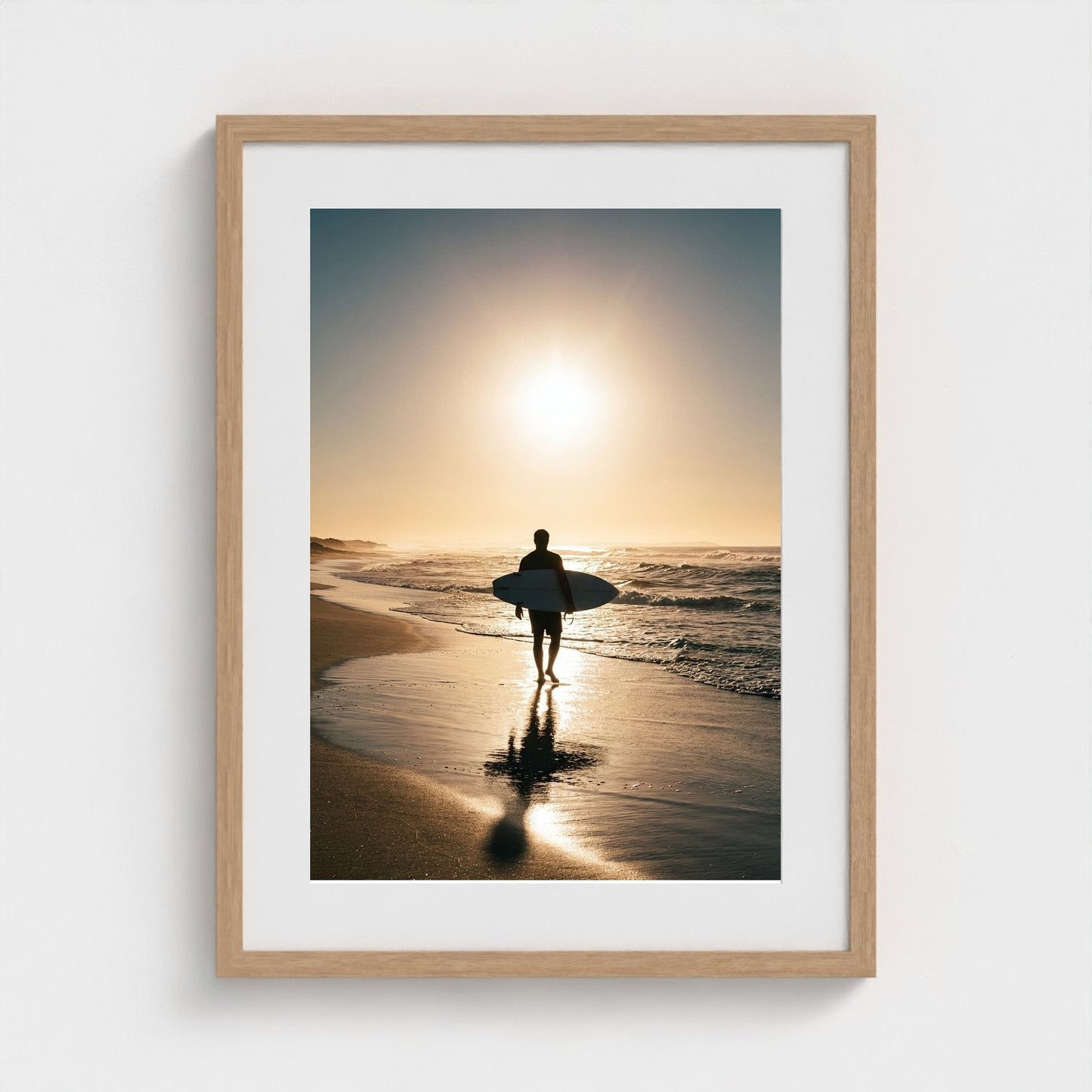 lone-longboarder-walking-across-sunlit-beach-cin 18x24-natural frame frame