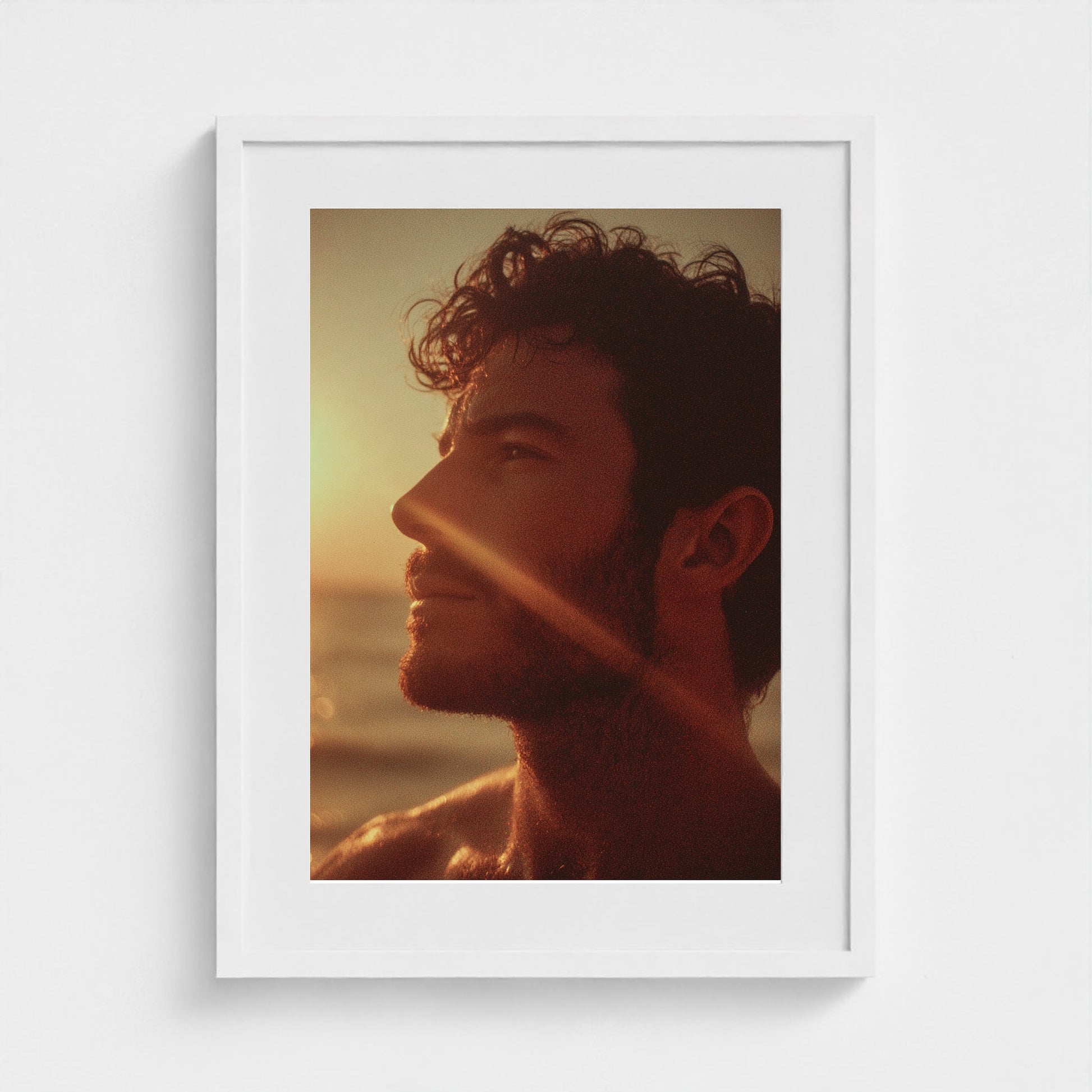 portrait-of-man-gazing-out-at-ocean-polaroid-sty 18x24-white frame frame
