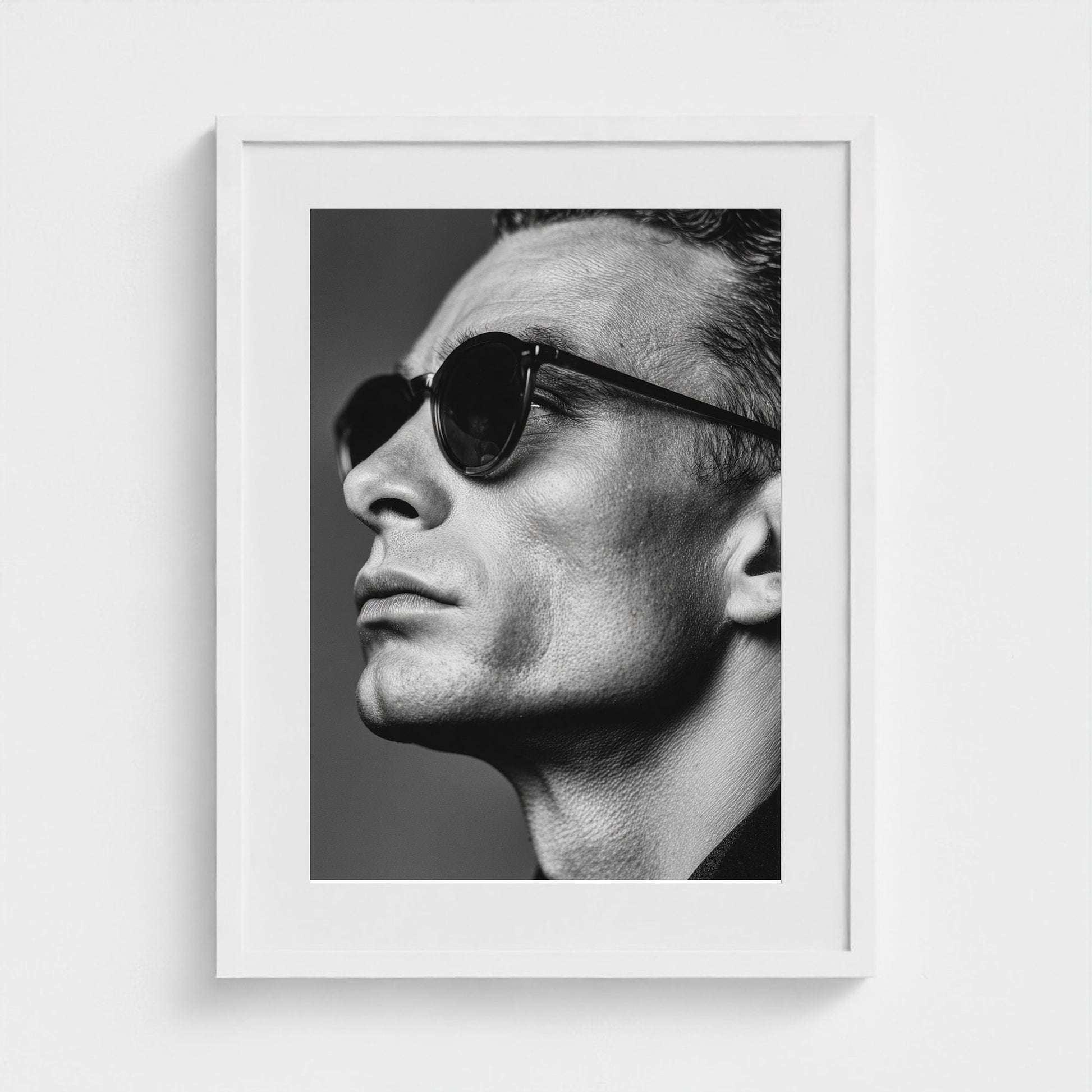 black-and-white-portrait-of-a-cool-guy-in-sungla 18x24-white frame frame