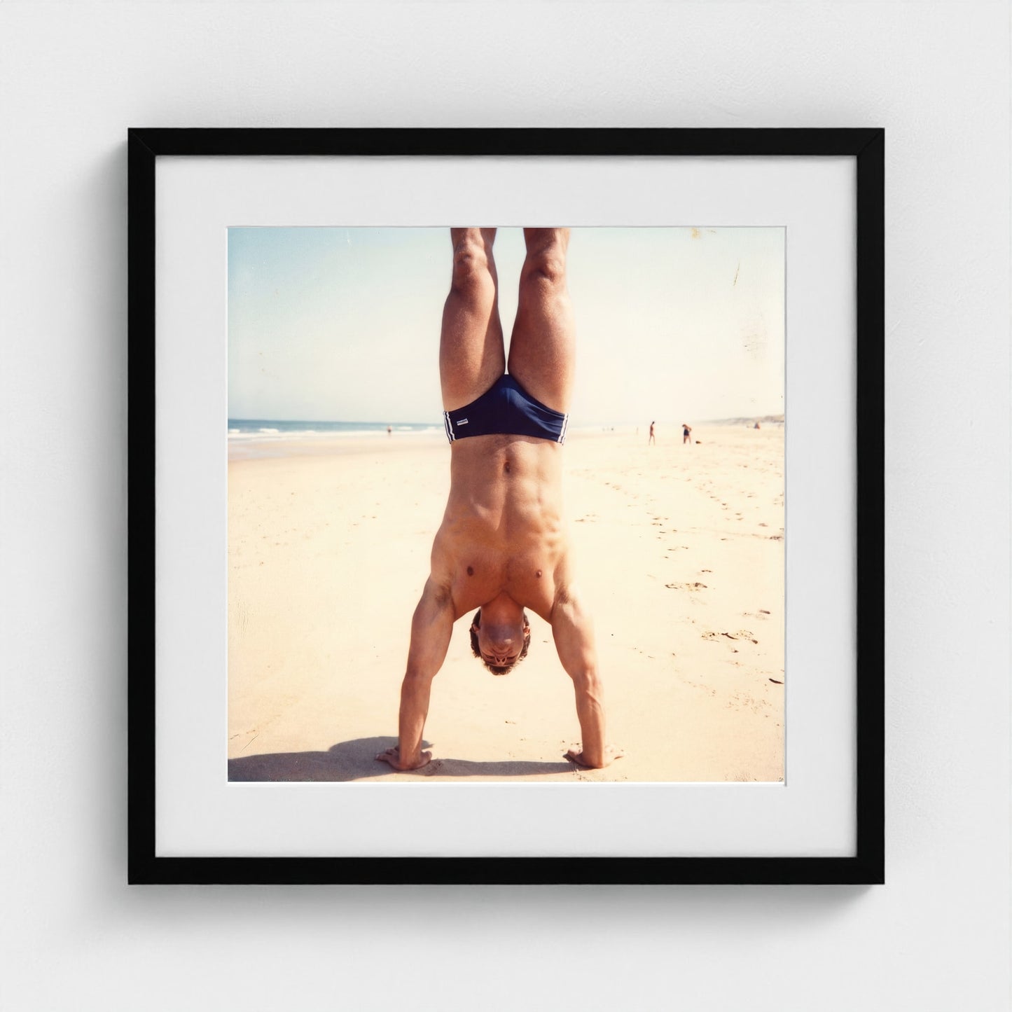 2026 03 12 17 48 00 Handstand Beach Muscular 20x20-black frame — Fire Island Modern