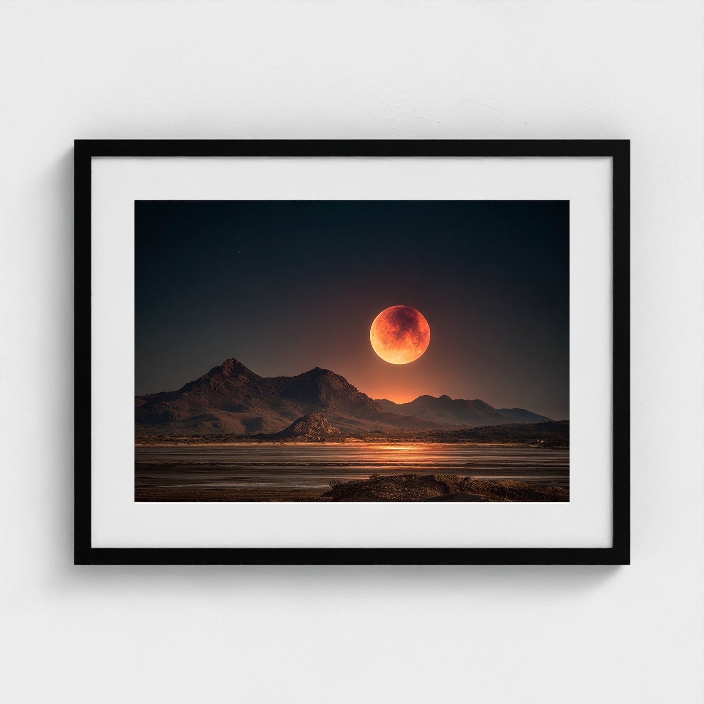 lunar-eclipse-casting-red-glow-over-barren-lands 24x18-black frame frame