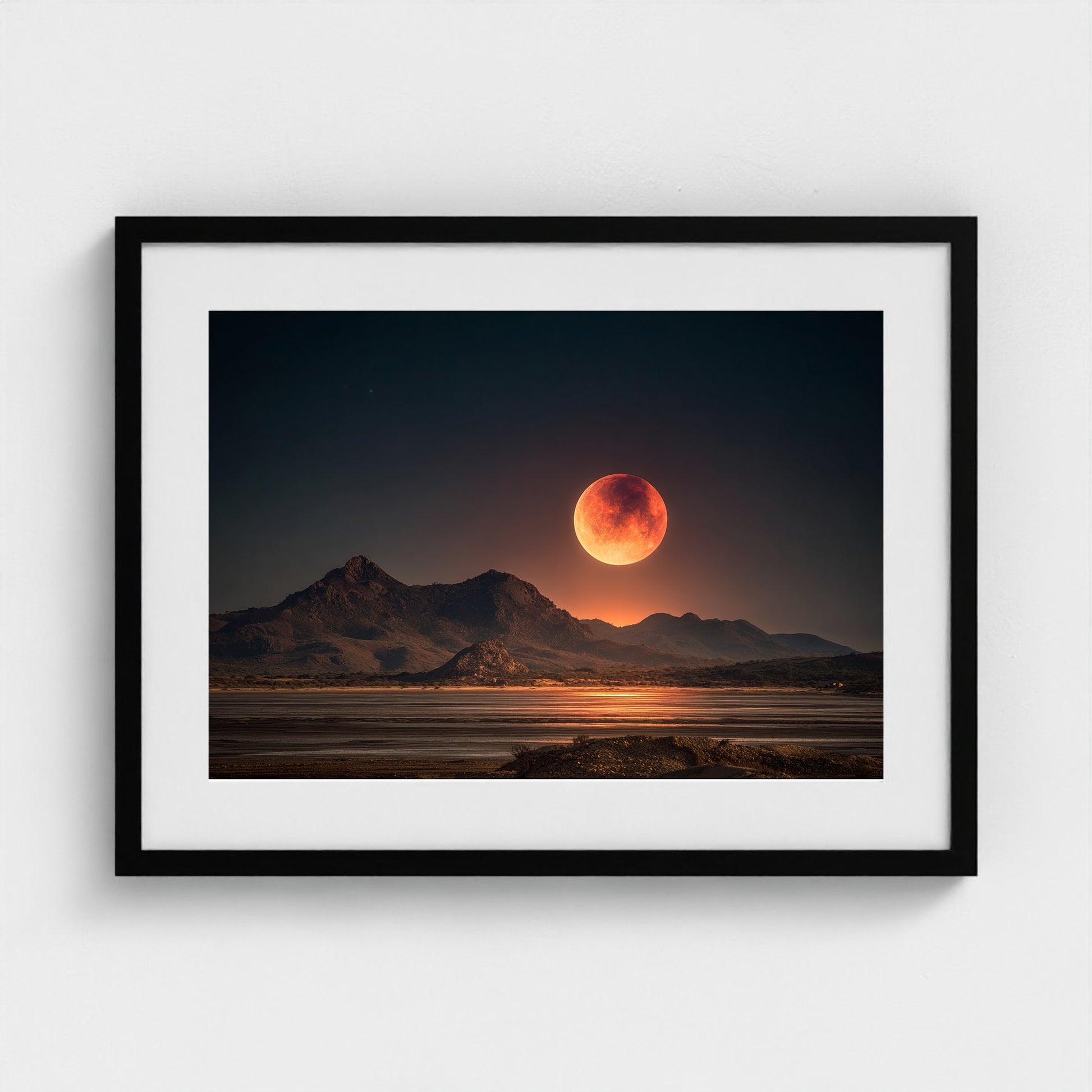 lunar-eclipse-casting-red-glow-over-barren-lands 24x18-black frame frame
