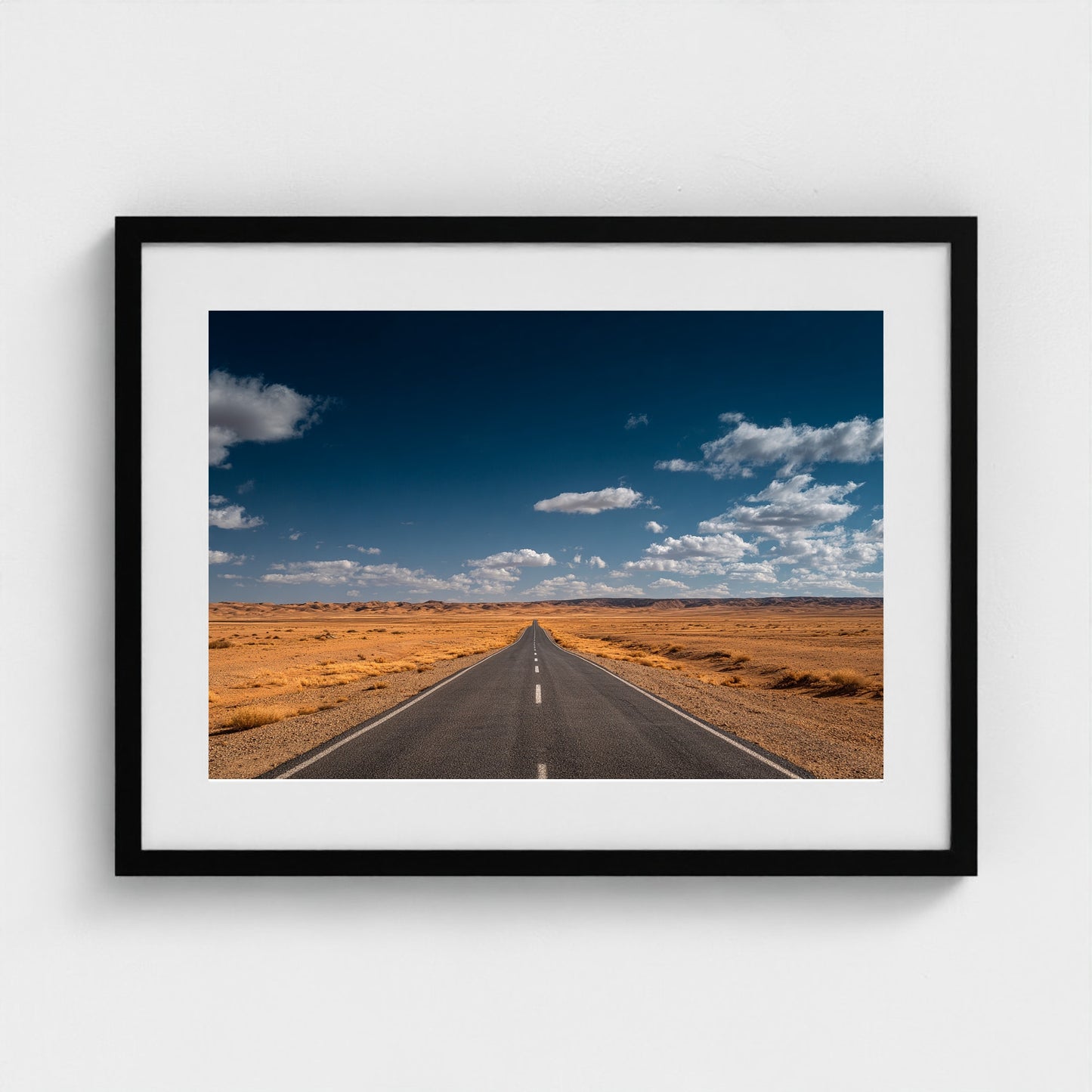 vast-open-desert-with-single-road-disappearing-i 24x18-black frame frame