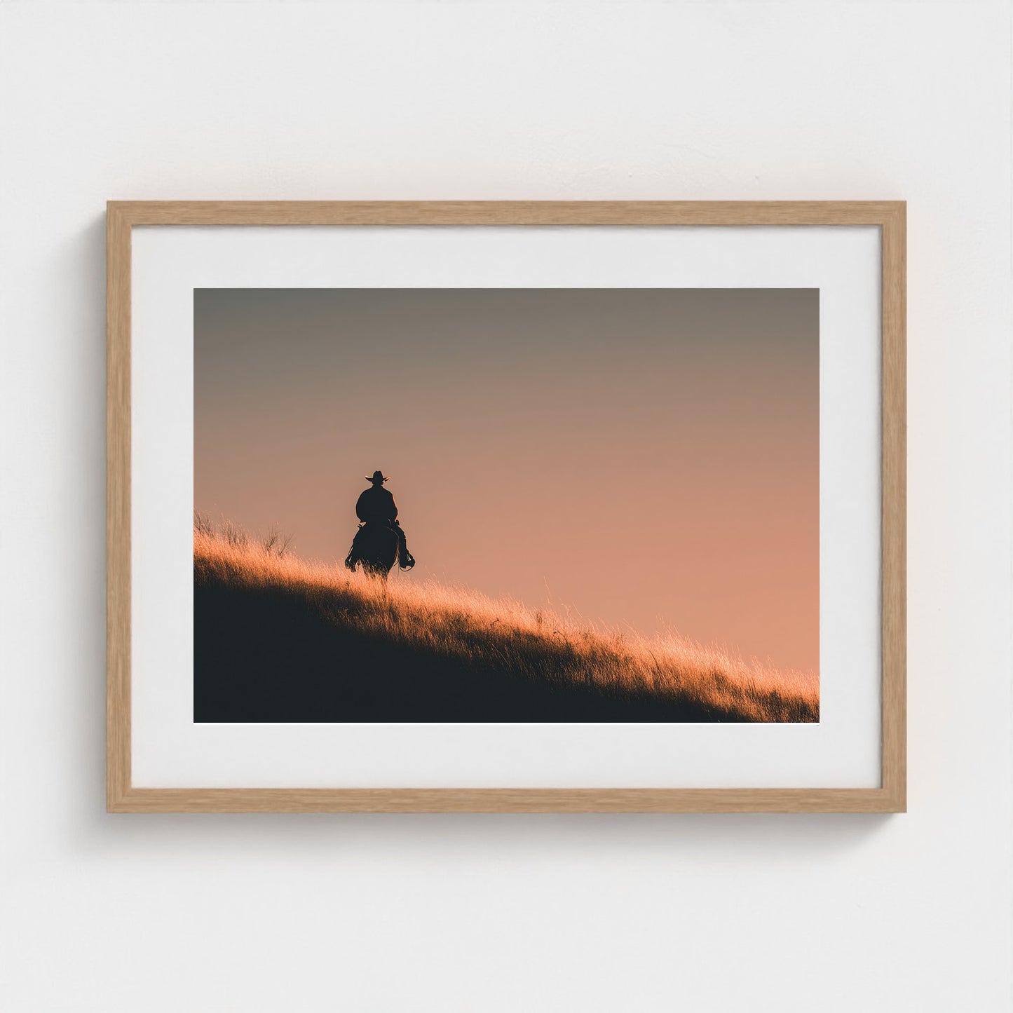 minimalist-cowboy-silhouette-at-sunrise-desert-h 24x18-natural frame frame