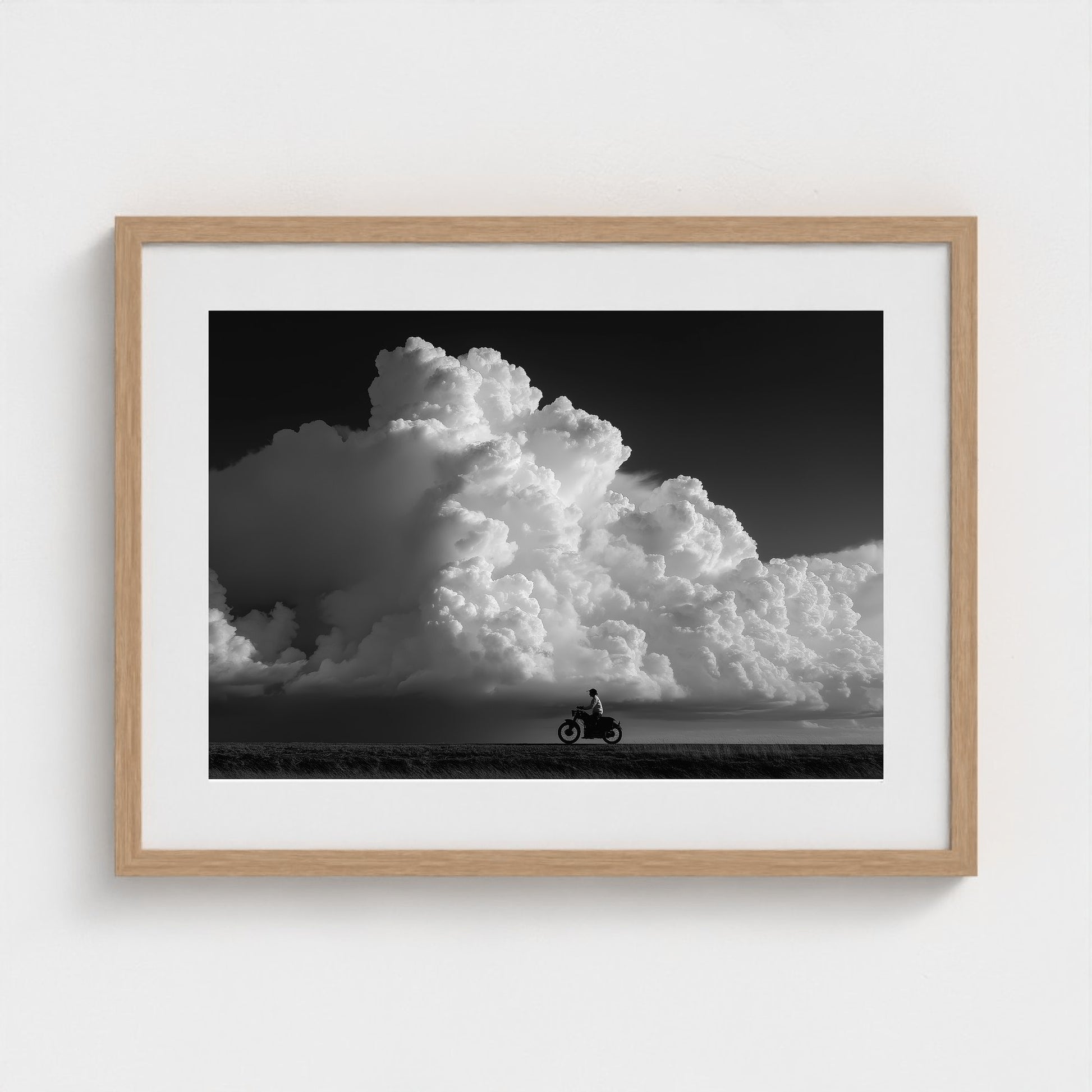 monochrome-thunderhead-build-up-distant-rider-bene-0d9ea2aa- 24x18-natural frame frame