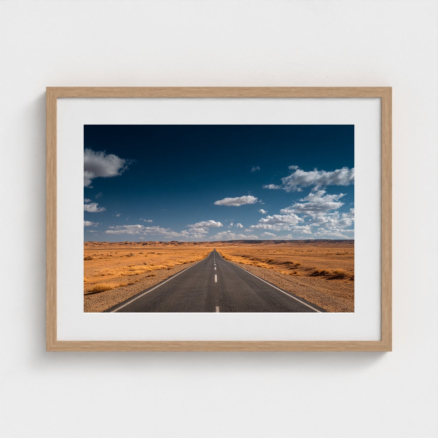 vast-open-desert-with-single-road-disappearing-i 24x18-natural frame frame