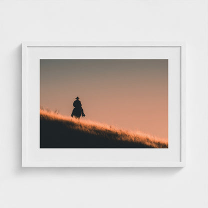 minimalist-cowboy-silhouette-at-sunrise-desert-h 24x18-white frame frame