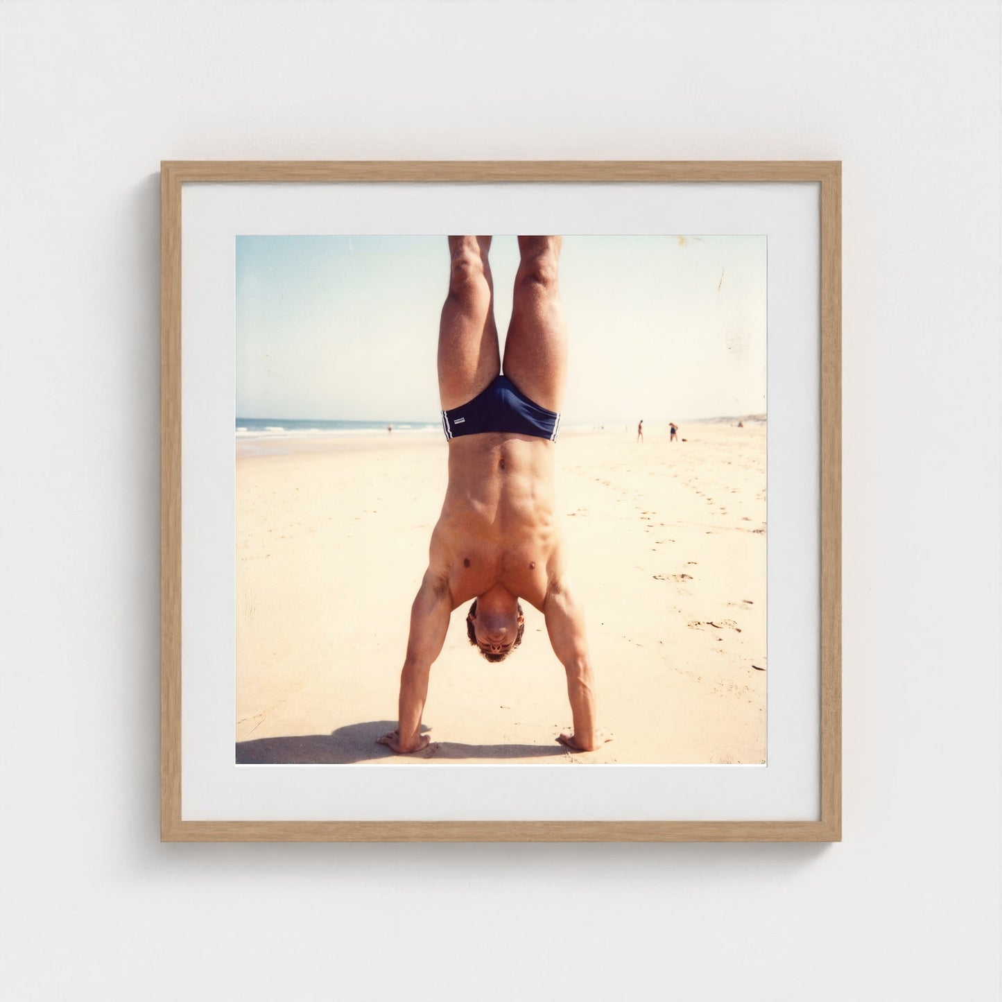 2026 03 12 17 48 00 Handstand Beach Muscular 24x24-natural frame — Fire Island Modern