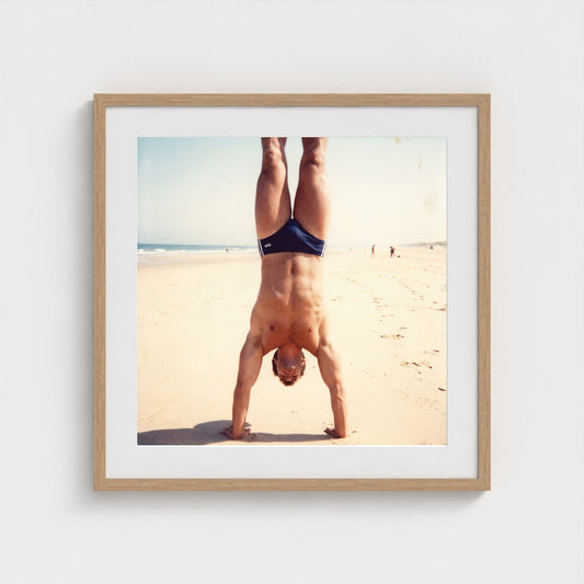 2026 03 12 17 48 00 Handstand Beach Muscular 24x24-natural frame — Fire Island Modern
