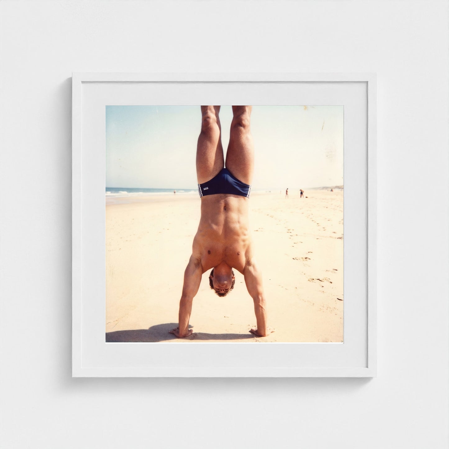 2026 03 12 17 48 00 Handstand Beach Muscular 24x24-white frame — Fire Island Modern