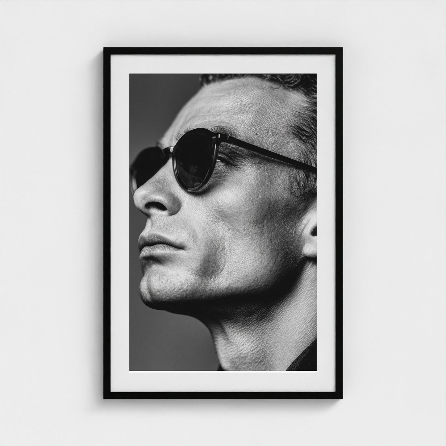 black-and-white-portrait-of-a-cool-guy-in-sungla 24x36-black frame frame