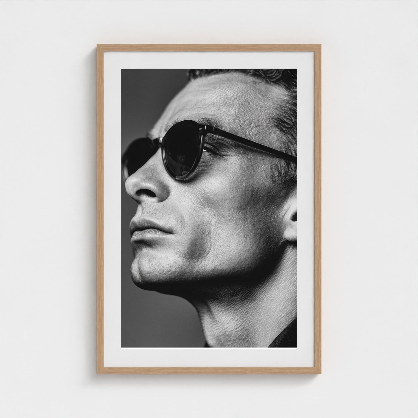 black-and-white-portrait-of-a-cool-guy-in-sungla 24x36-natural frame frame