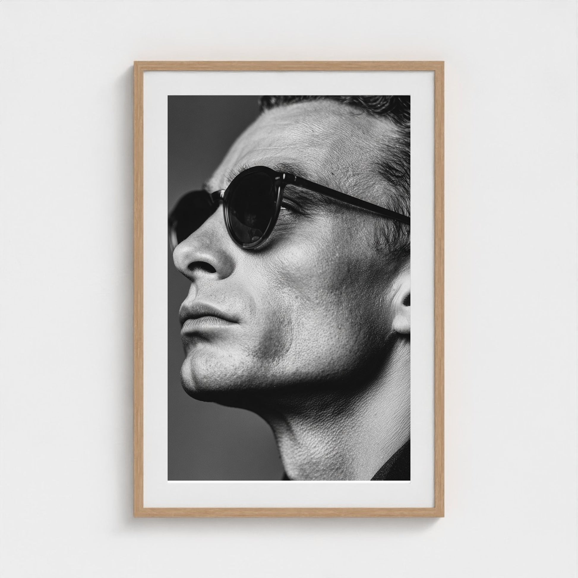 black-and-white-portrait-of-a-cool-guy-in-sungla 24x36-natural frame frame
