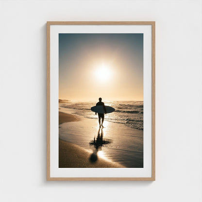 lone-longboarder-walking-across-sunlit-beach-cin 24x36-natural frame frame