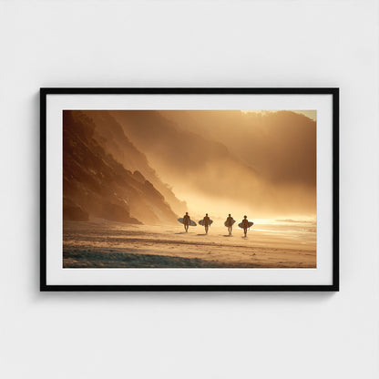 group-of-surfers-walking-across-beach-with-board 36x24-black frame frame