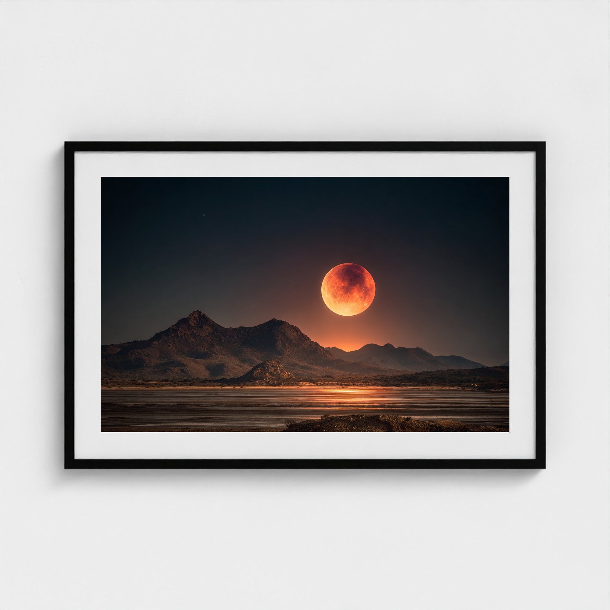 lunar-eclipse-casting-red-glow-over-barren-lands 36x24-black frame frame
