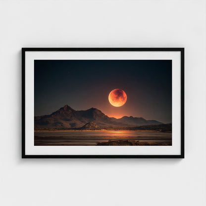 lunar-eclipse-casting-red-glow-over-barren-lands 36x24-black frame frame