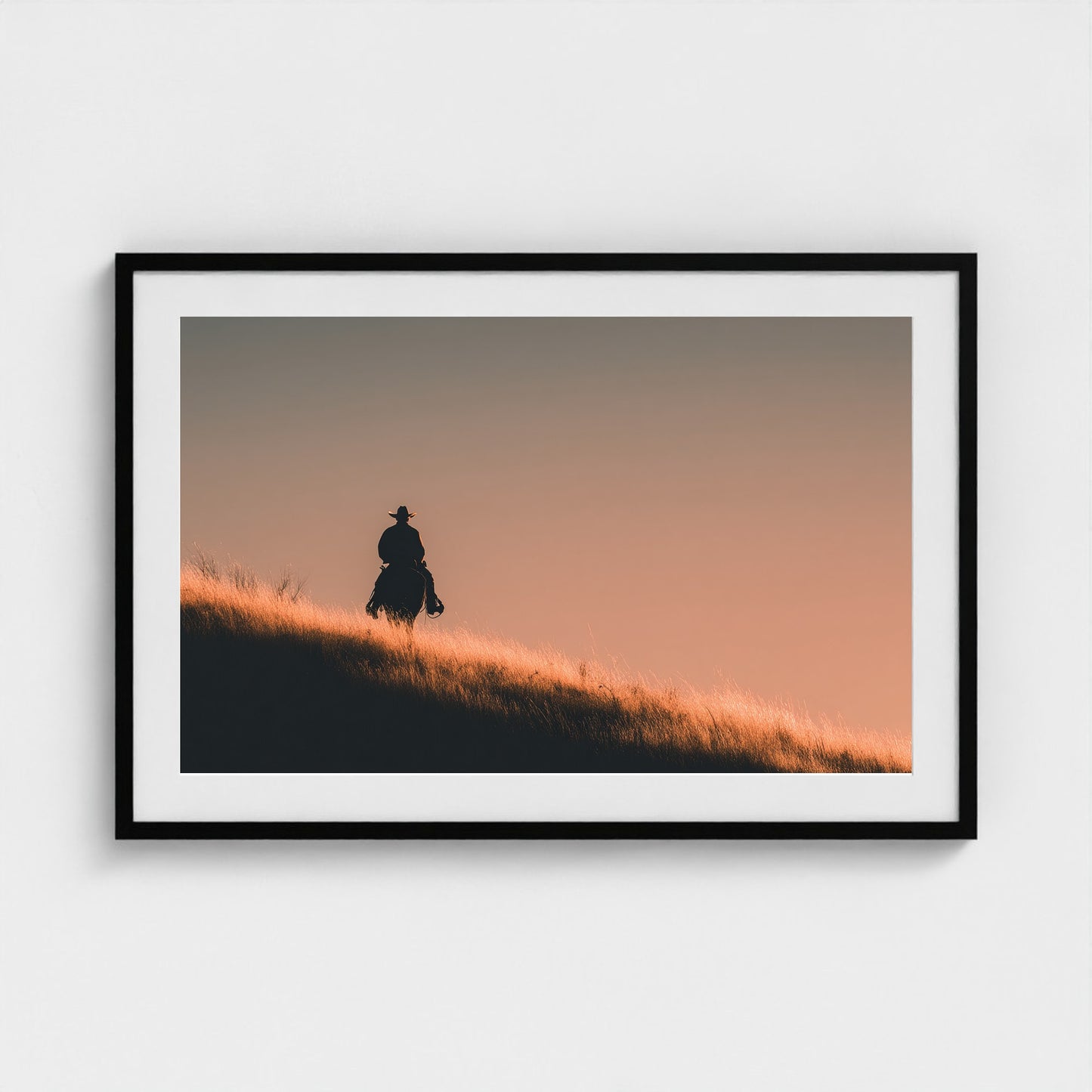 minimalist-cowboy-silhouette-at-sunrise-desert-h 36x24-black frame frame