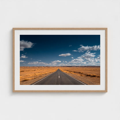 vast-open-desert-with-single-road-disappearing-i 36x24-natural frame frame