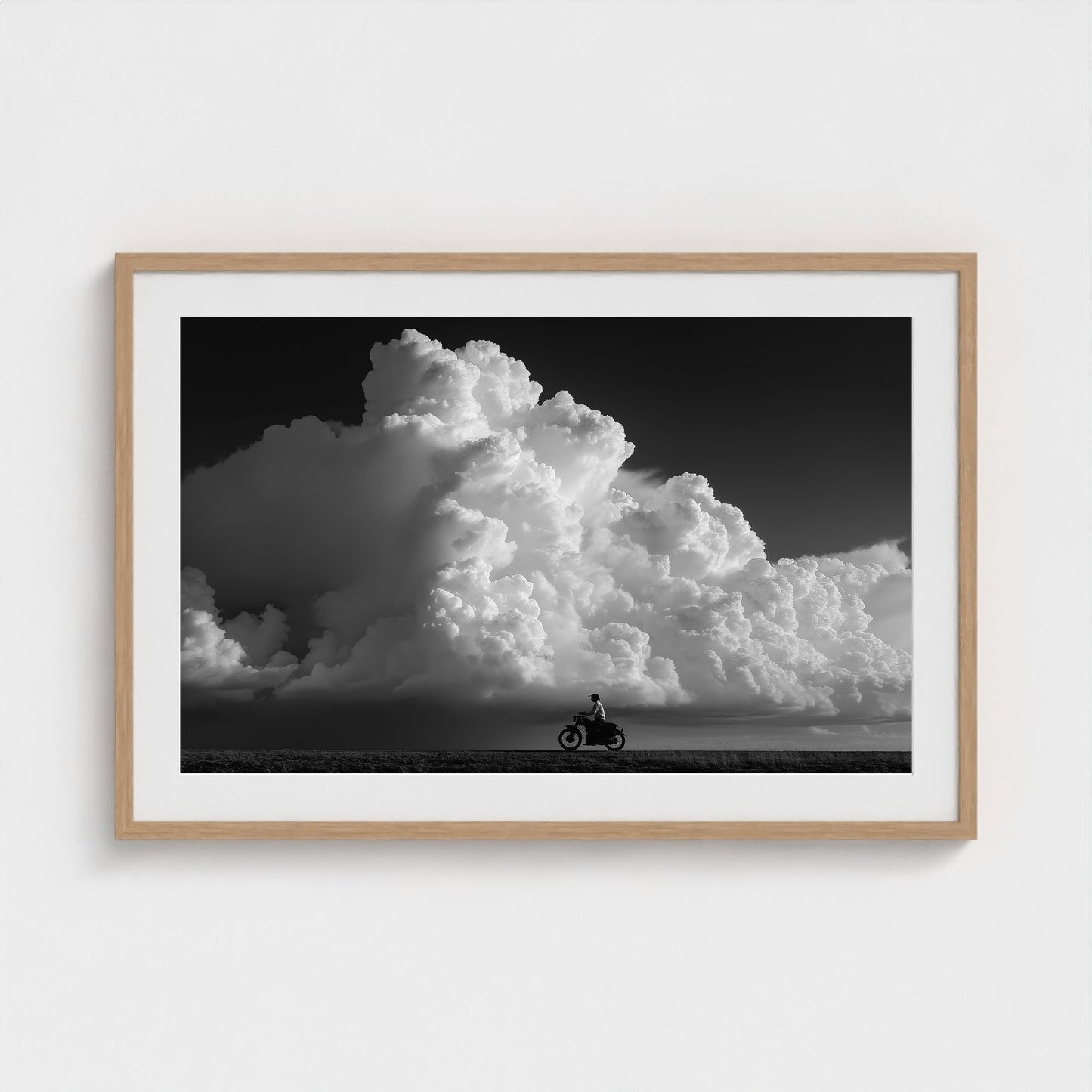 monochrome-thunderhead-build-up-distant-rider-bene-0d9ea2aa- 36x24-natural frame frame