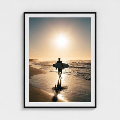 lone-longboarder-walking-across-sunlit-beach-cin 36x48-black frame frame