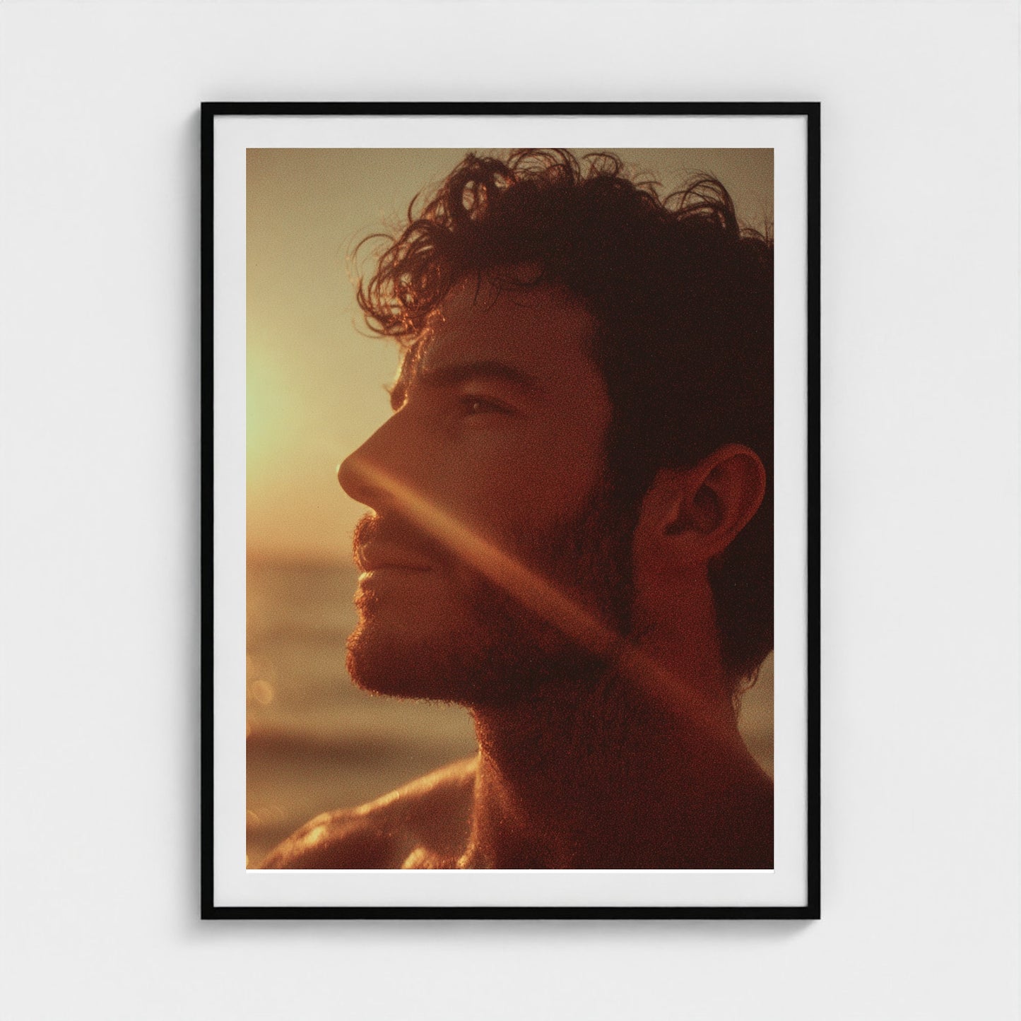 portrait-of-man-gazing-out-at-ocean-polaroid-sty 36x48-black frame frame