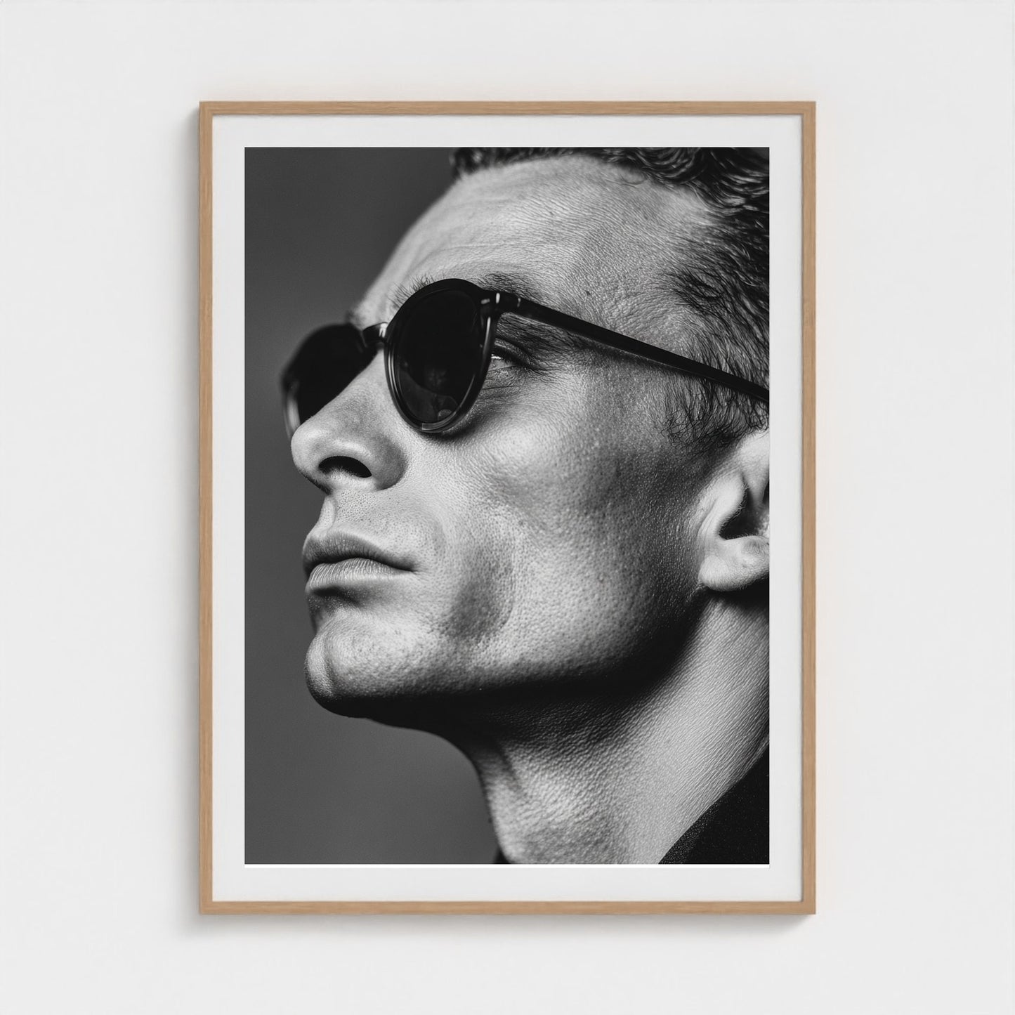 black-and-white-portrait-of-a-cool-guy-in-sungla 36x48-natural frame frame