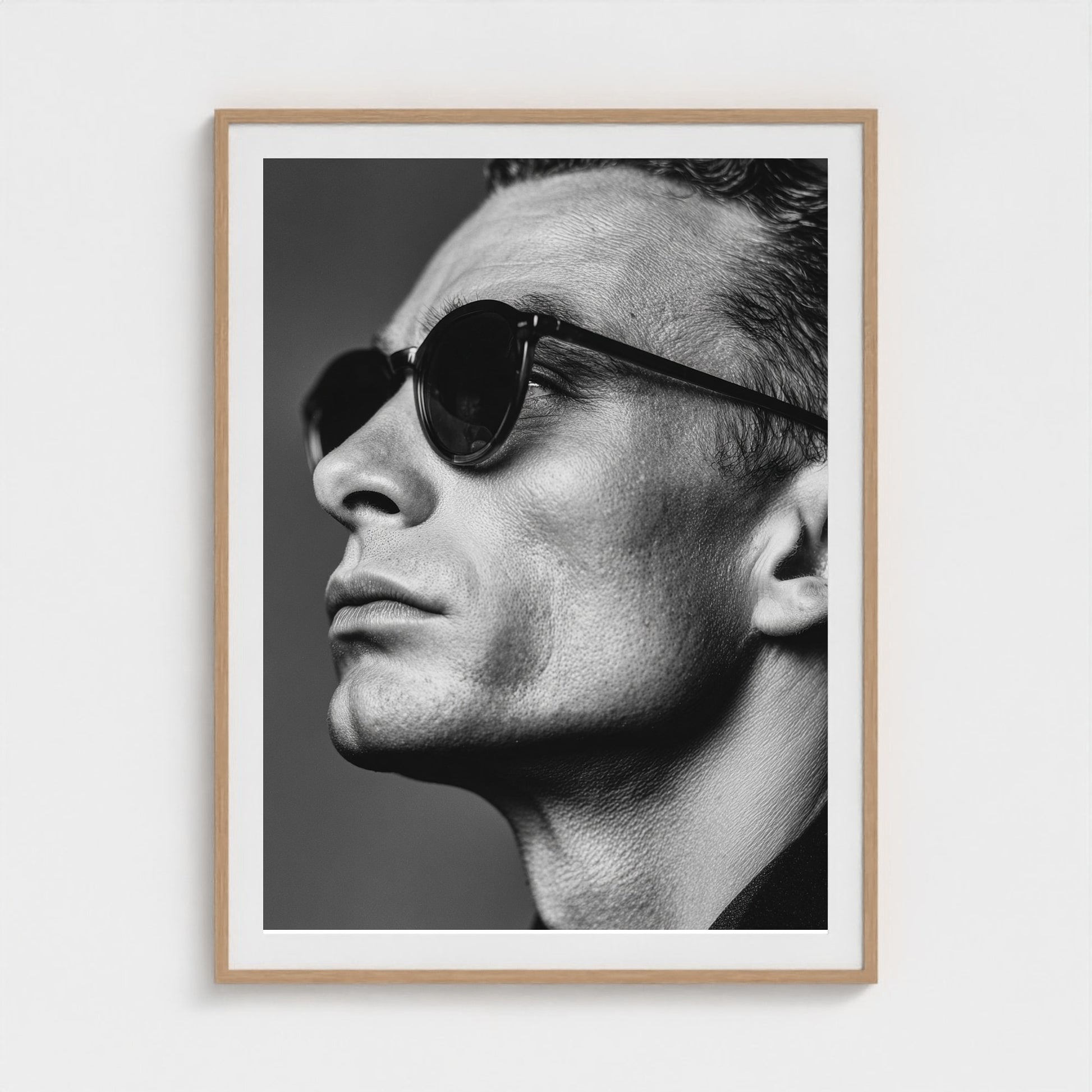 black-and-white-portrait-of-a-cool-guy-in-sungla 36x48-natural frame frame