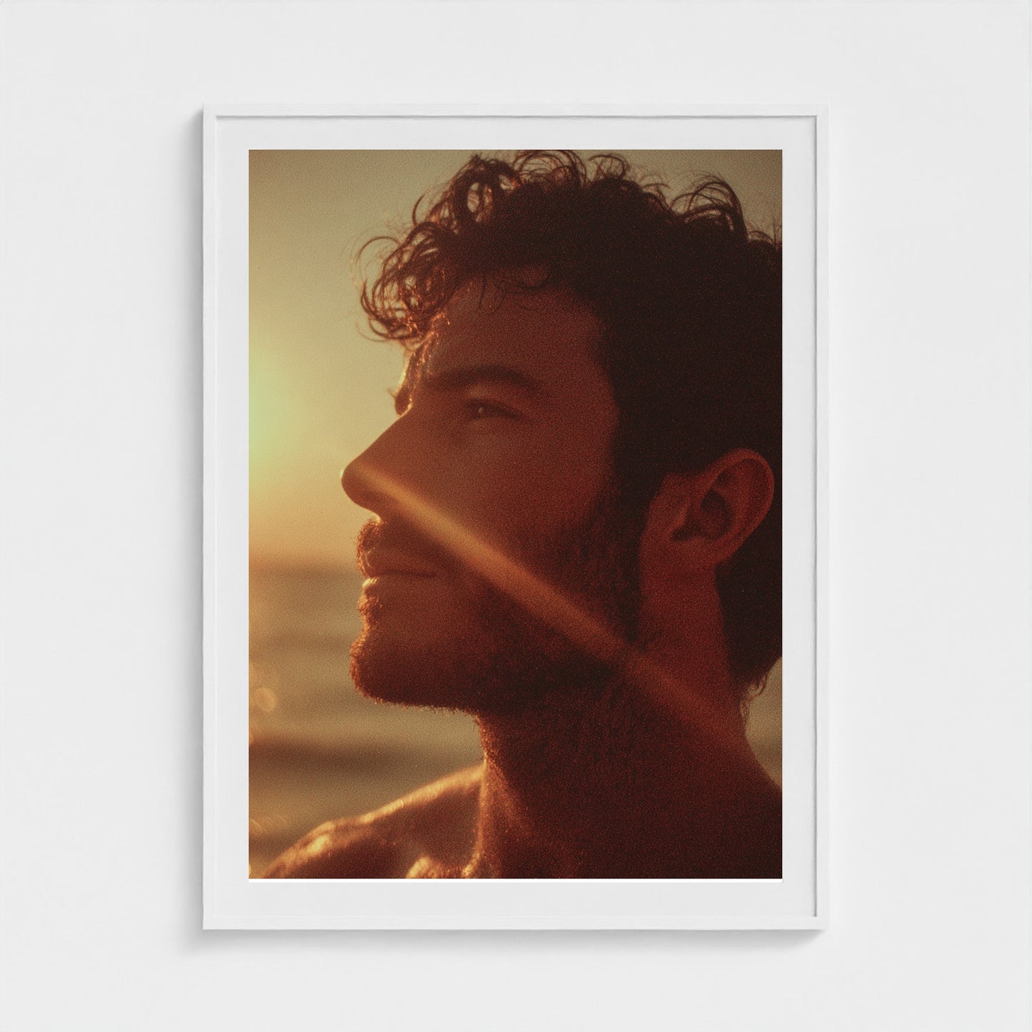portrait-of-man-gazing-out-at-ocean-polaroid-sty 36x48-white frame frame