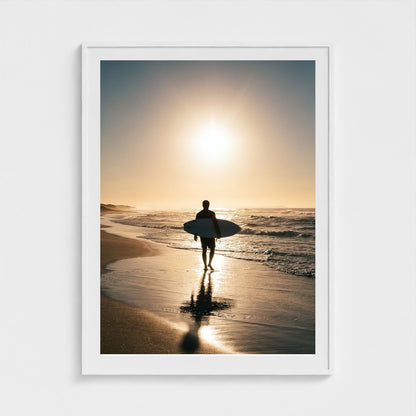 lone-longboarder-walking-across-sunlit-beach-cin 36x48-white frame frame