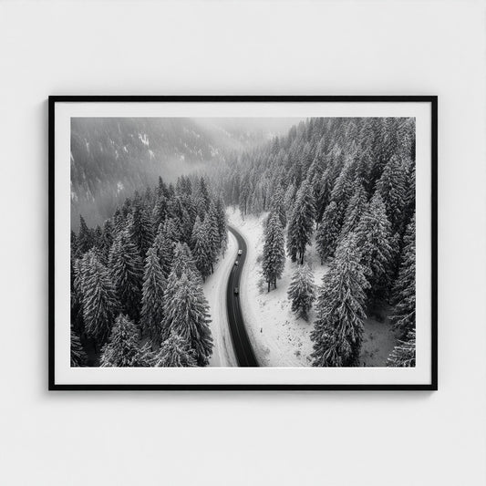 aerial-of-snow-covered-road-slicing-through-dark 48x36-black frame frame