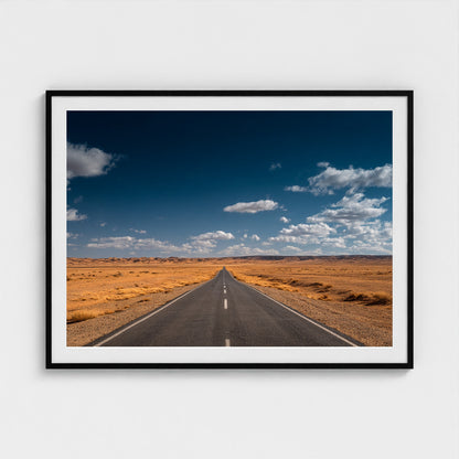 vast-open-desert-with-single-road-disappearing-i 48x36-black frame frame