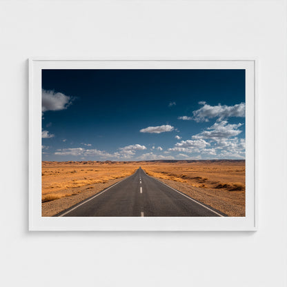 vast-open-desert-with-single-road-disappearing-i 48x36-white frame frame